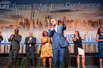 Charlie Romo, an “American Idol” contestant and a social studies teacher at New Dorp HS on Staten Island, wows the crowd with his rendition of “New York, New York" at the 2025 UFT Spring Education Conference. 