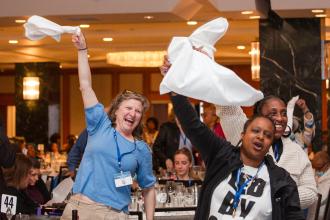 UFT members cheer the speakers at the union’s annual spring gathering of educators.