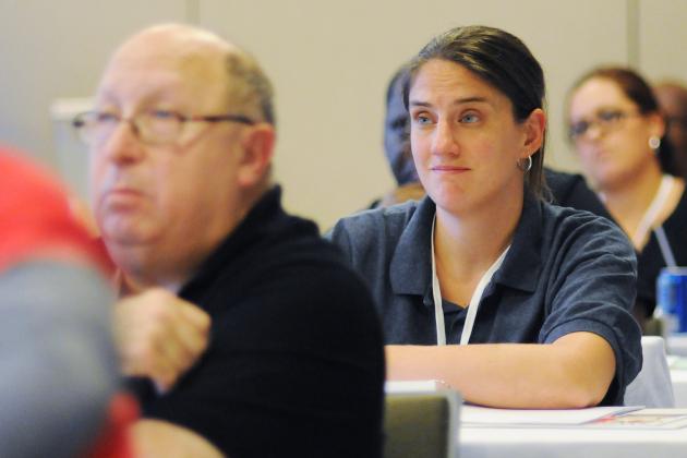 Stephina Fisher joins in a conversation with colleagues.