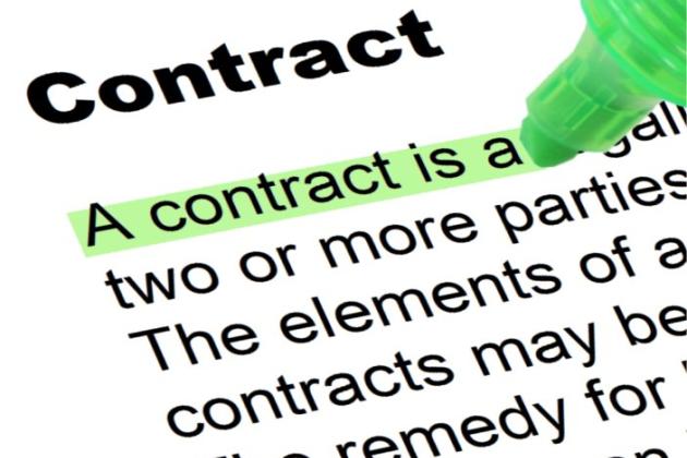 Contract with green highlighted words