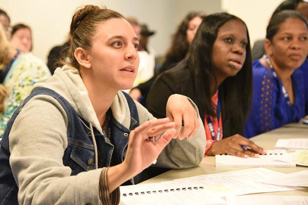 Danielle Roedig, a teacher at Vista Academy in Brooklyn, asks a question in a wo