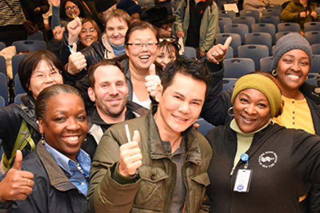 Tom Pang (center) and other members of the Visiting Nurse Service chapter celebr