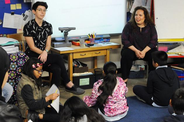 Teachers Alison Dempsey (left) and Maria Koutras listen as parents of the childr