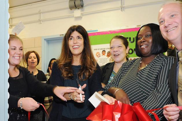 Cutting the ribbon on the new Teacher Center at CS 300 in the Bronx