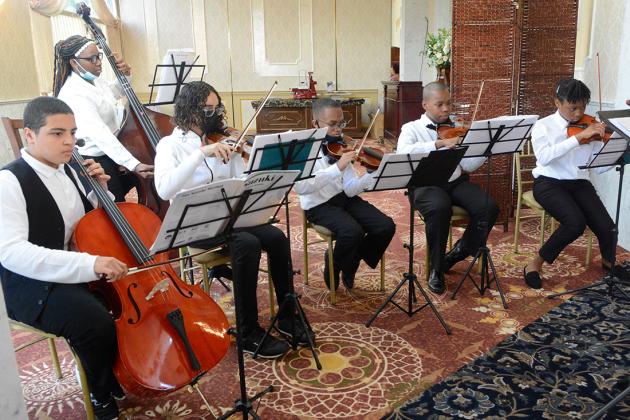 Students play a live performance 
