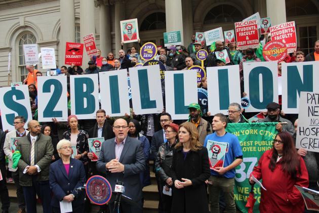Michael Mulgrew speaks at a healthcare rally at City Hall