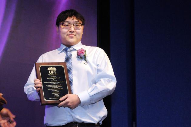 Alex Chen, who teaches electrical installation at Manhattan’s Coop Tech, wins the Edwin Espaillat Award, which is given to an educator enrolled in the Success Via Apprenticeship program during the 2026 UFT CTE Awards.