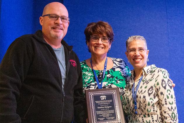 Emma Mulgrew with Michael Mulgrew and Rosemarie Thompson after receiving an award