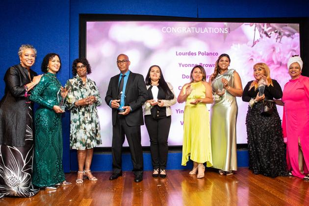 A group of award winners pose for a photo on stage at the 2024. Provider Appreciation Awards at UFT Headquarters on May 10, 2024