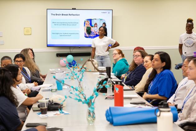 MindUp Program Manager Corneisha Clarke leads a workshop about mindfulness activities using the five senses.