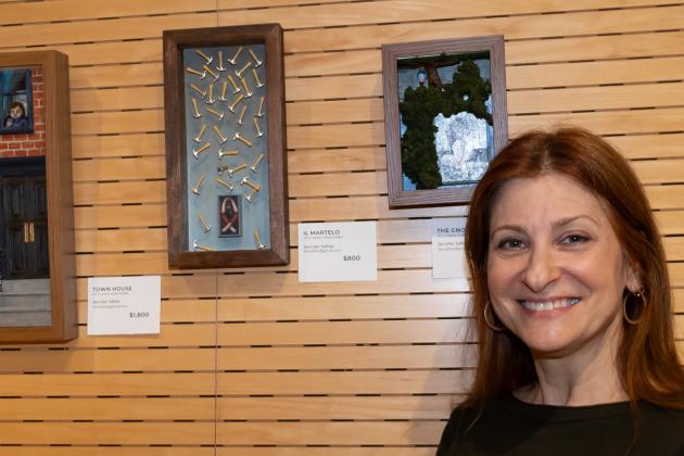 Jennifer Saftler of Brooklyn Brownstone School stands alongside her pieces at at the New York City Art Teachers Association/UFT’s Dreams Art Show on May 10, 2024.
