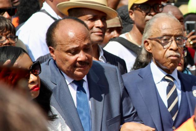 Al Sharpton and the King Family lock arms