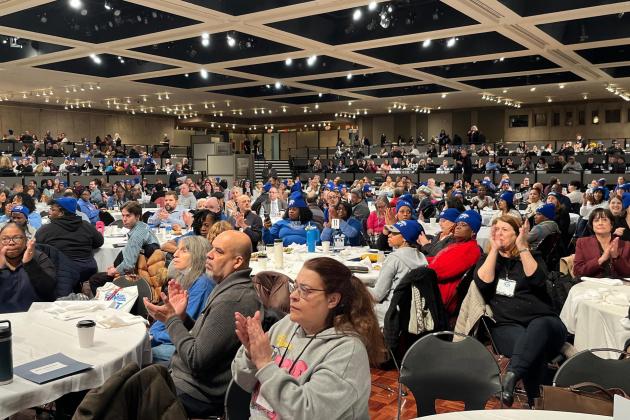 A large group of UFT members pack a convention center in Albany