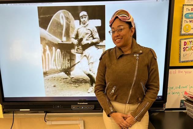 Second-grade teacher dresses up each day as a historical figure and teaches her students about that person.