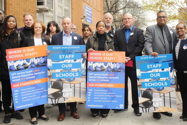 A group photo at a press conference for special education concerns. 