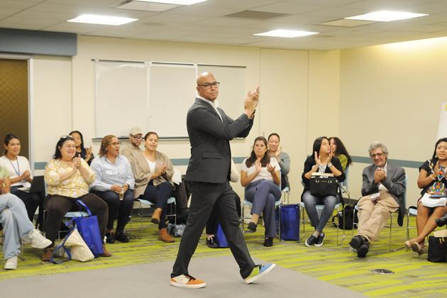 Nationally recognized arts educator Rodney Eric Lopez interacts with attendees at the NYC Association of Foreign Language Teachers/UFT annual fall conference at union headquarters.  