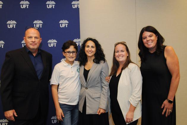 A group photo after a press conference for December 23 being an off-day for schools.