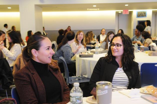 Two school psychologists have a conversation while eating breakfast during the 2024 UFT Psychologist Appreciation Day on Nov. 8, 2024 at UFT headquarters. 