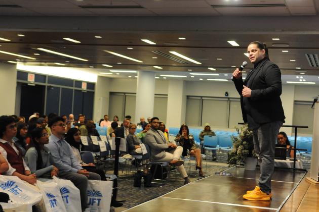 A speaker addresses the crowd during a scholarship ceremony