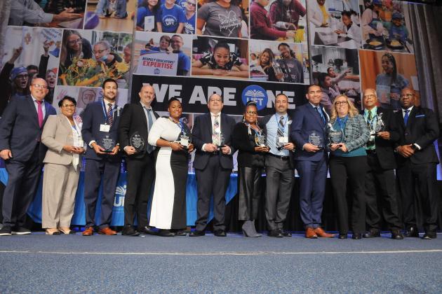 Albert Lee Smallheiser Award winners pose for a photo on stage at Teacher Union Day on Nov. 3, 2024 at the Midtown Hilton