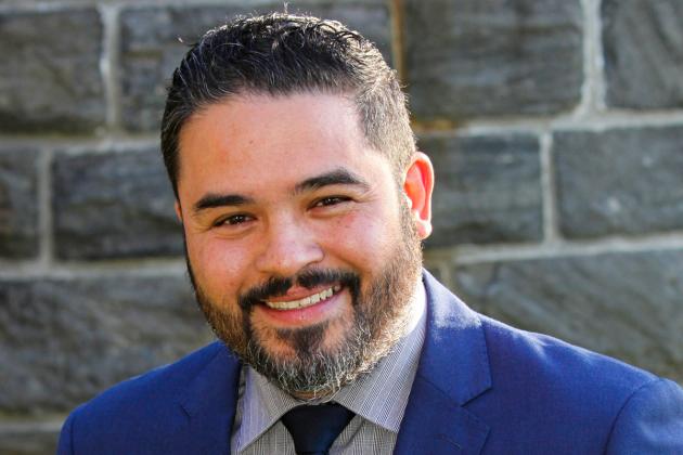 Portrait of a bearded brunette man smiling