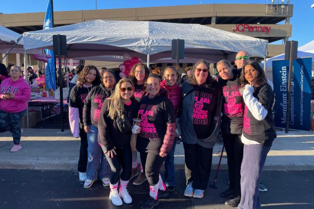 Members from PS 100 in the Bronx smile for the camera in their UFT Making Strides shirts.