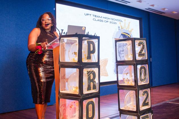 UFT Vice President for Academic High Schools Janella Hinds, the architect and emcee of the event, addresses members in attendance at the UFT Academic High School Awards on April 25, 2025. 