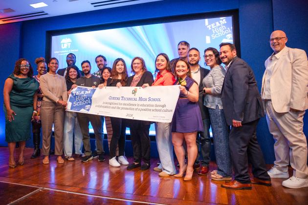 Members from Queens Technical HS are all smiles as they take home a Team High School Award.