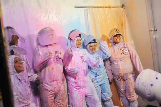 New UFT members smile as they get paint "bombed" during a new member event on Feb. 27. 