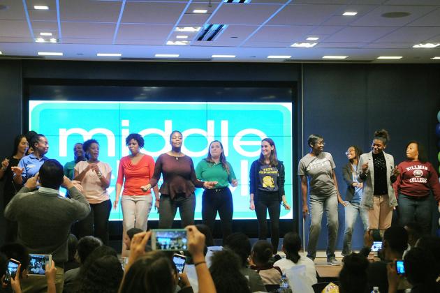Group of teachers standing on UFT stage