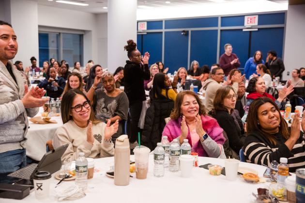 Attendees at 2025 Clinician Appreciation Day give a round of applause. 