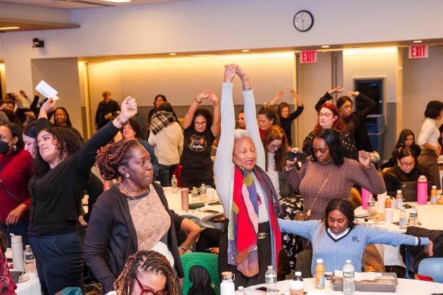 Clinicians take a stretch break between speakers at the 2025 Clinician Appreciation Day held at UFT headquarters on Jan. 27, 2025. 