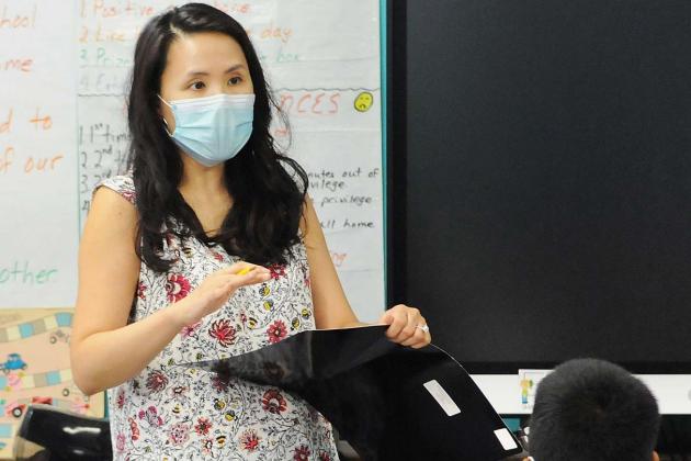 A teacher teaching a class