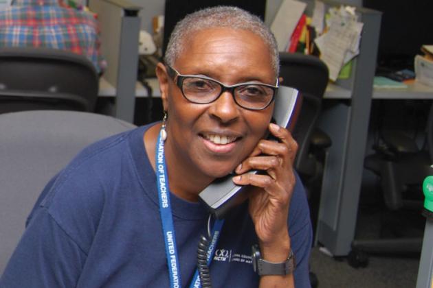 UFT staff member on phone