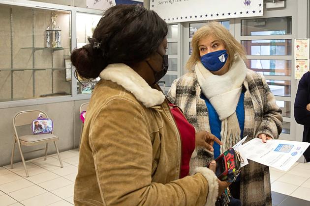 Colleen Chiauzzi, the chapter leader at PS/IS 295 in Queens, passes out leaflets.