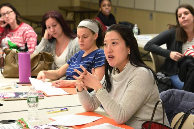 Group of UFT members sitting in classroom