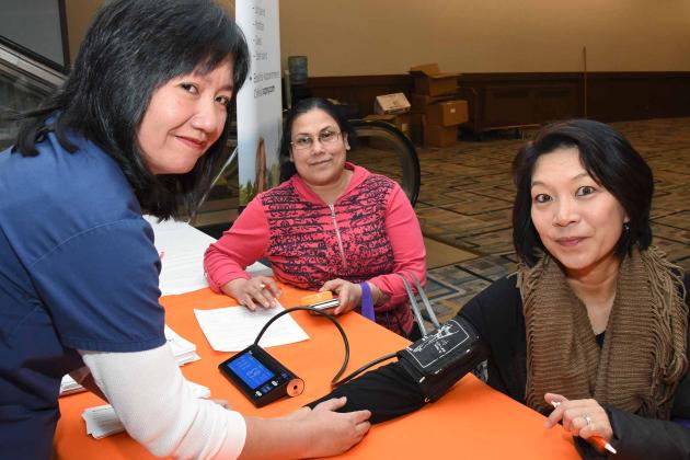 UFT member getting blood pressure reading