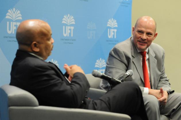 UFT President Michael Mulgrew speaking to someone