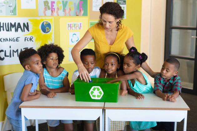 A teacher with young students
