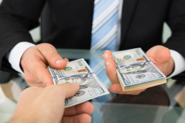 Handing over money