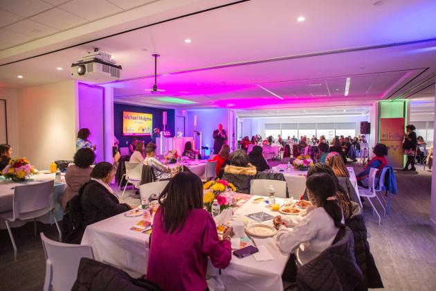 Attendees at the 2025 HERstory brunch listen as UFT President Michael Mulgrew pays tribute to women who’ve mentored him.