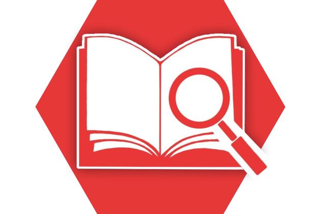 Image shows a magnifying glass over a book