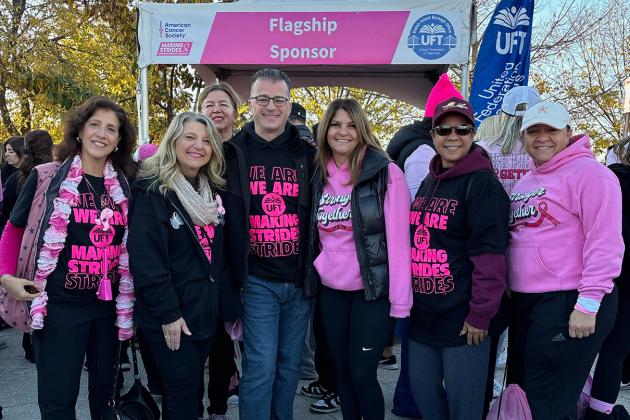 UFT members on Staten Island take a group photo at a breast cancer awareness walk.