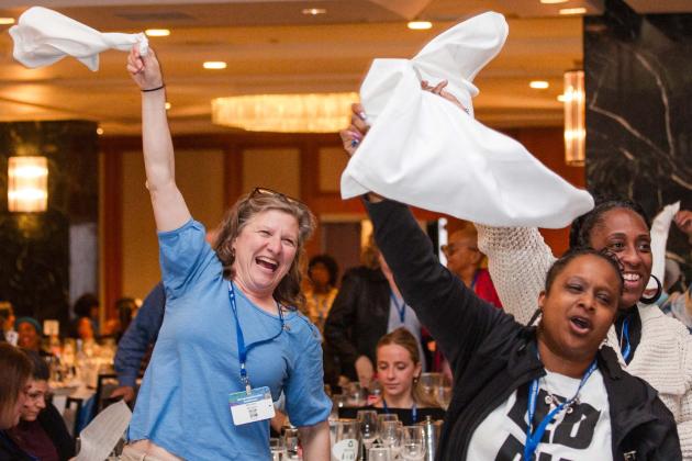 UFT members cheer the speakers at the union’s annual spring gathering of educators.