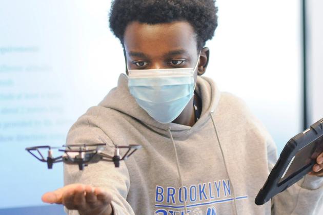 Kids in a class doing STEAM