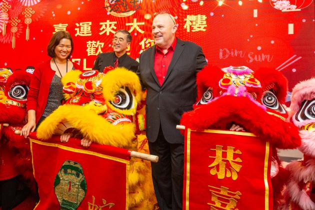 Posing with the dancing lions are (from left) UFT Treasurer Victoria Lee, Asian American Heritage Committee Chair Seung Lee and UFT President Michael Mulgrew at the 2025 UFT Asian Heritage Committee Lunar New Year Banquet.