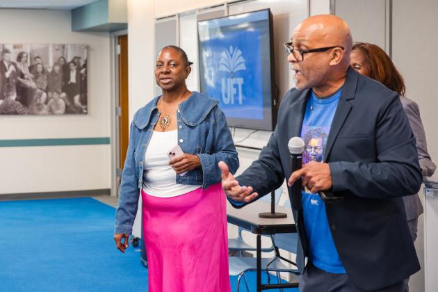 Cynthia Alvarez (left), the UFT Manhattan parent and community liaison, addresses attendees along with Nicholas Cruz, the UFT director for parent and community engagement.