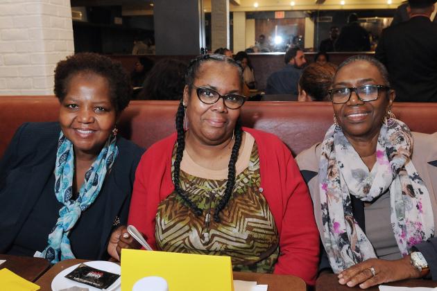 Three women sitting at a table