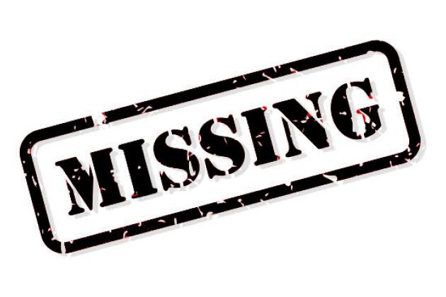 A sign reading "Missing"