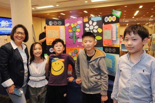 Connie Cai, a speech teacher at PS 42 in Manhattan, shows off her students’ project, “Lunch from Home.”